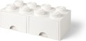 Witte LEGO opbergdoos met acht noppen en twee lades, op een witte achtergrond.