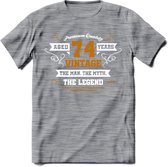 74 Jaar Legend T-Shirt | Goud - Wit | Grappig Verjaardag en Feest Cadeau Shirt | Dames - Heren - Unisex | Tshirt Kleding Kado | - Donker Grijs - Gemaleerd - XL