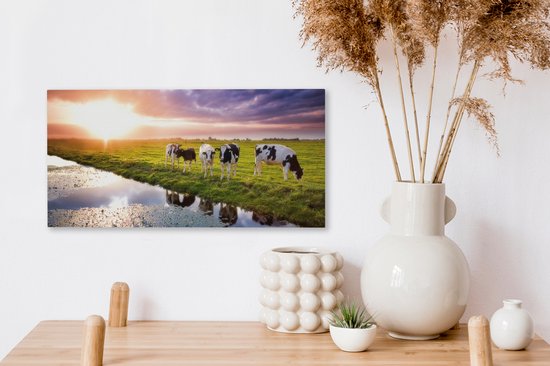 Tableau sur toile Vaches pendant un coucher de soleil - 40x20 cm - Décoration murale Art