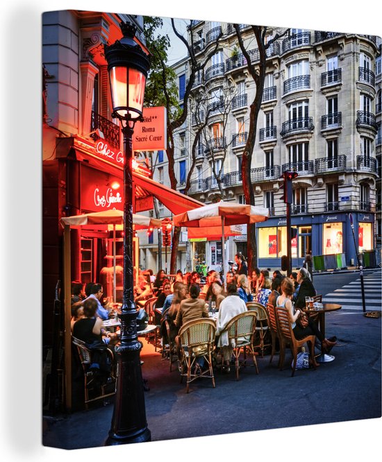 Tableau Peinture sur toile Terrasse illuminée rouge à Paris en France -  90x90 cm -... | bol.com