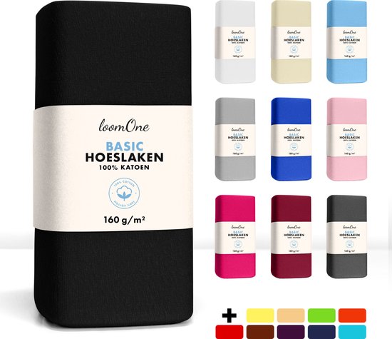 Vue d'ensemble des couleurs de draps housse disponibles, avec un drap housse noir au premier plan.
