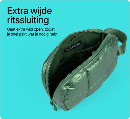 Openstaande metallic groene Coze Mini tas met vakjes aan de binnenkant.