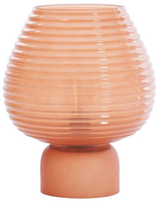 Lampe de table ronde en verre côtelé rose avec un design segmenté en nid d'abeille et une base mate.