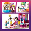 Kleine LEGO Friends scènes met minipoppen bij een reuzenrad en kramen met snoep.