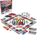 Monopoly Grand Prix bordspel met F1-thema, met de doos ernaast. Meerdere componenten zichtbaar.