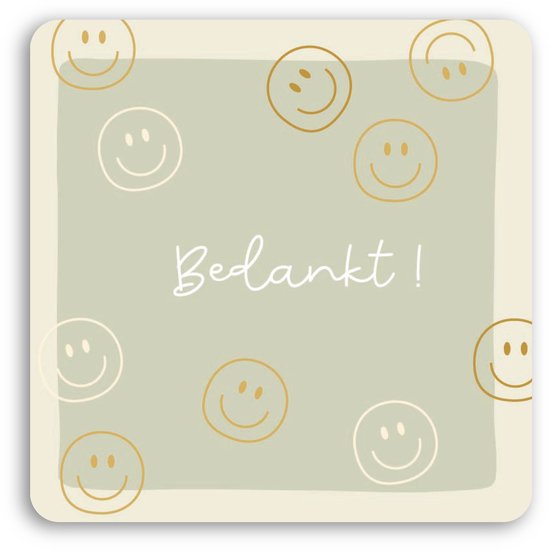 Groene kaart met de tekst "Bedankt!" en gouden en witte smiley gezichtjes.