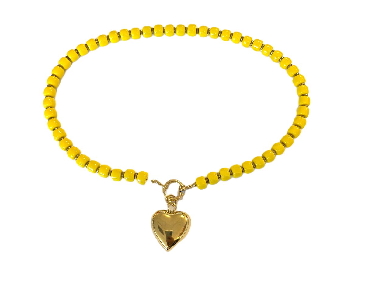 Ketting glaskralen geel /hart goud