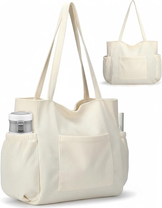 Sac fourre-tout en velours côtelé blanc cassé avec deux poches latérales et une poche avant, avec des anses et un deuxième petit sac en arrière-plan.