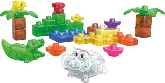 Jelly Blox Jelly Jungle set: groene krokodil, glitter nijlpaard, rode aap, gele vogel en palmbomen.