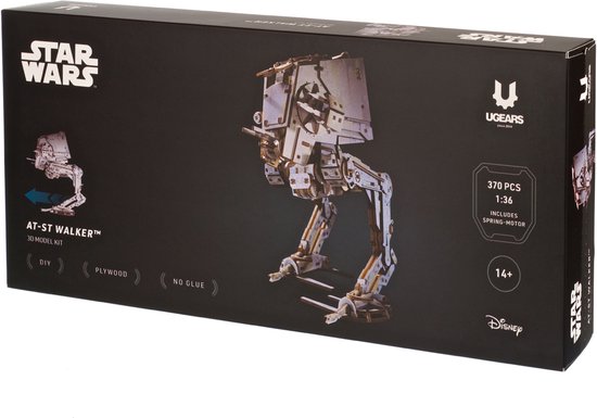 Doos van een AT-ST Walker 3D modelbouwkit, met afbeeldingen van het model, het Star Wars logo en informatie over het bouwpakket.