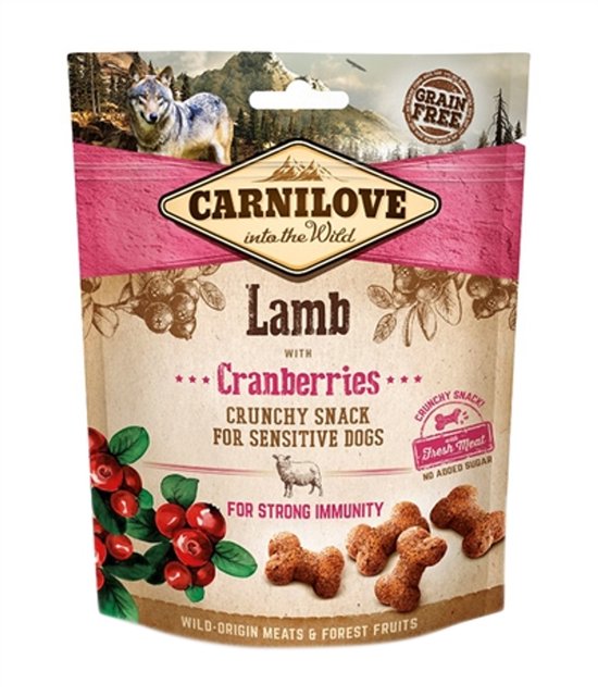 Carnilove Lamb met Cranberries hondenvoer verpakking, met een wolf en lam afgebeeld.