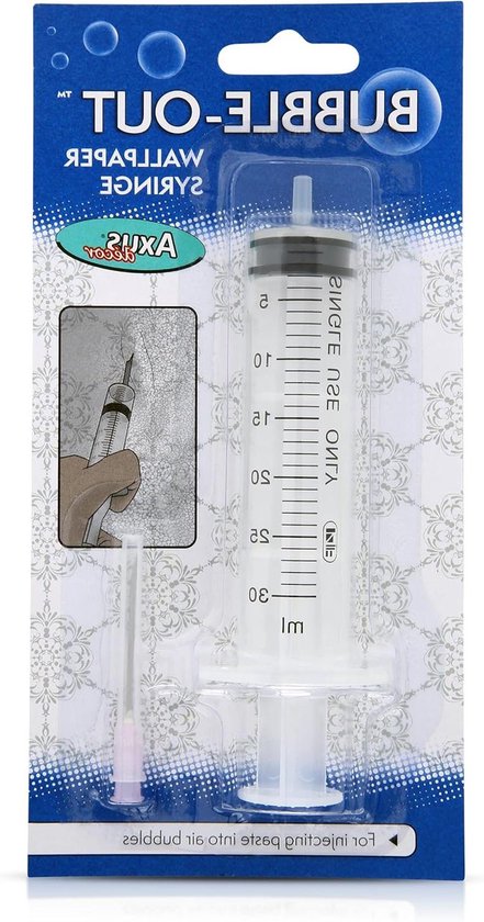 Verpakking met een 30ml spuit en losse naald, voor het verwijderen van luchtbellen uit behang.