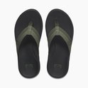Zwarte Reef slippers met olijfgroene banden en een Reef logo op de binnenzool.