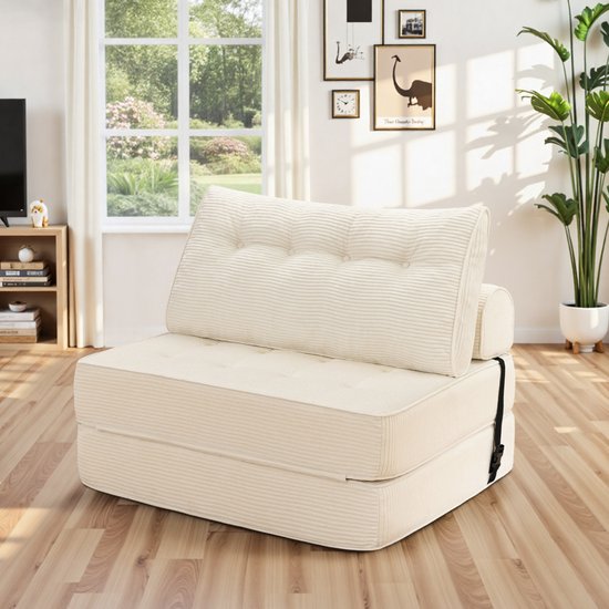 Wit gestreept corduroy slaapbankje met kussen, in een woonkamer.