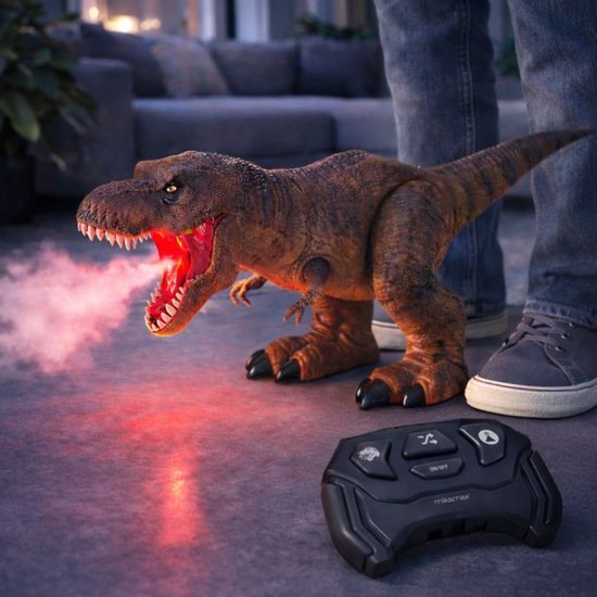 Bruine T-Rex spuwt rode nevel uit, met afstandsbediening op de grond.