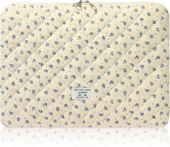 Housse d'ordinateur portable matelassée crème avec imprimé floral bleu et une étiquette au centre.