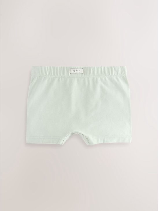 Mintgroene meisjes-shorty met elastische tailleband en label met drie hartjes.