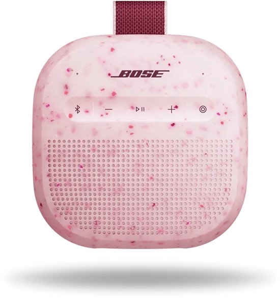 Roze Bose Soundlink Micro speaker met vlekjes, paarse knoppen en luidspreker, en een lusje.