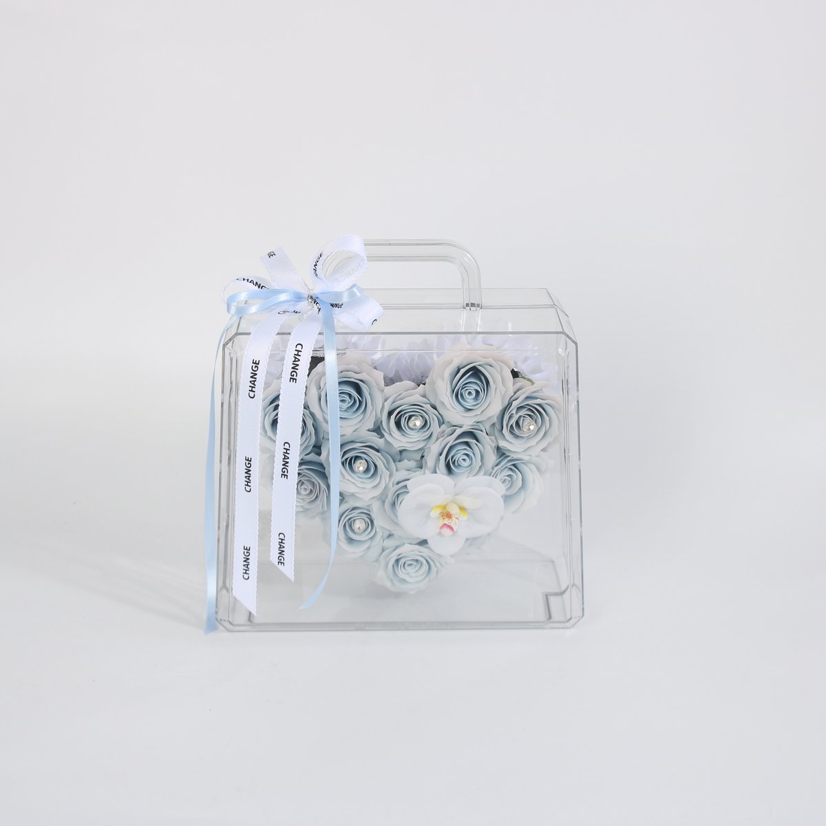 La Roselle Amsterdam Blue Heart Rose Case – Luxe Kunstrozen in Transparante Handtas – Lichtblauw Bloemenarrangement met Orchidee Lichtblauw en wit