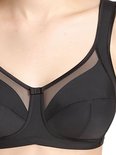 Zwarte beha met mesh-inzetstukken en verstevigde cups. De beha heeft brede bandjes en een sluiting aan de voorkant.