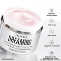 Color Wow Dreaming pot met roze crème, met iconen voor sealen, ontpluizen, glans, elasticiteit en hittebescherming.