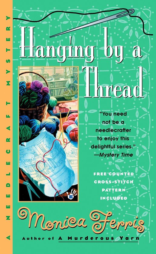 Boek kaft met borduurwerk: 'Hanging by a Thread', een naaldkunst mysterie met Monica Ferris. Geborduurde letters en wol.