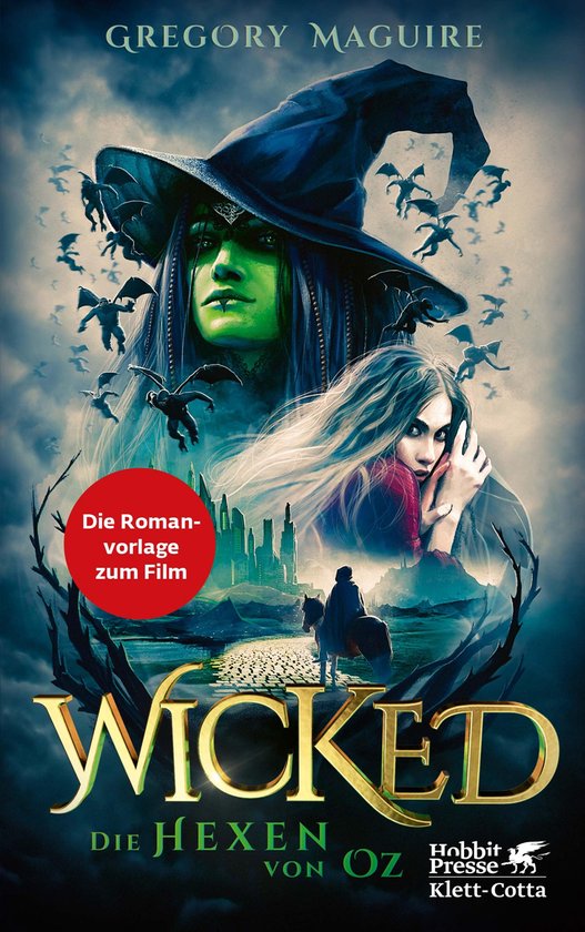 Boekomslag met een groene heks met een blauwe hoed en een meisje met blond haar, omringd door vliegende wezens. 'Wicked Die Hexen von Oz' staat onderaan.