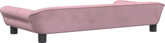 Canapé pour chien en velours rose, arrière avec pieds ronds.