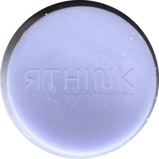 Bovenaanzicht van een paarse RTHINK conditioner bar met "RTHINK your daily routine" in reliëf.