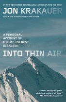 Couverture du livre de Jon Krakauer "Into Thin Air" avec un sommet enneigé et le texte "A PERSONAL ACCOUNT OF THE MT. EVEREST DISASTER".