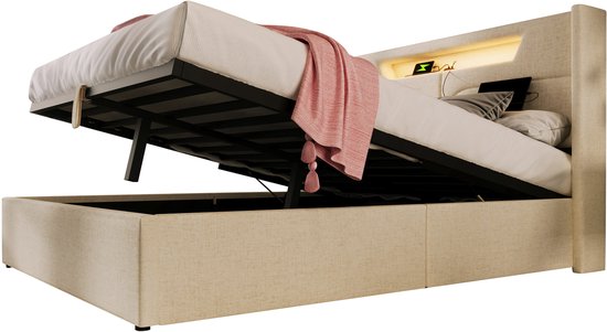 Lichtbeige opbergbed met gasveer en LED-verlichting in het hoofdbord, de opbergruimte is open.