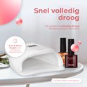 Witte UV-lamp naast twee flesjes Moods Gellac: 'Autumn Glow Dark Brown' en 'Autumn Glow Fall Firefly'.