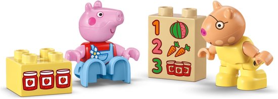 LEGO Duplo Peppa Pig Peppa en George met blokken met jam en cijfers.