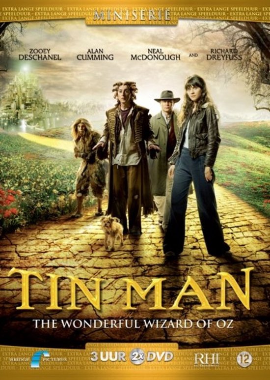 Poster met de cast van Tin Man, The Wonderful Wizard of Oz. Zes personen en een hond staan op een gele bakstenen weg.