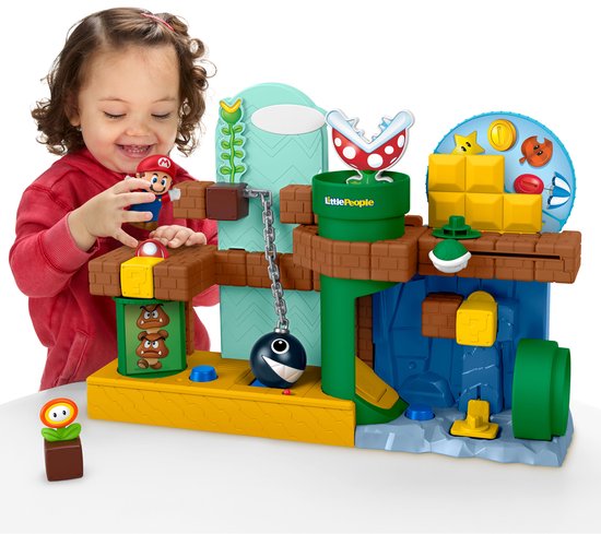 Meisje speelt met Super Mario speelset.