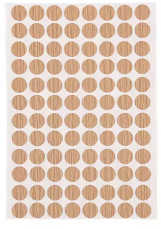 Sticker vel met 100 ronde, lichtbruine stickers met houtnerf-structuur.