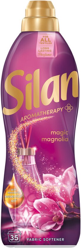 Bouteille d'adoucissant Silan Aromatherapy Magic Magnolia avec des fleurs de magnolia et une goutte d'huile essentielle.