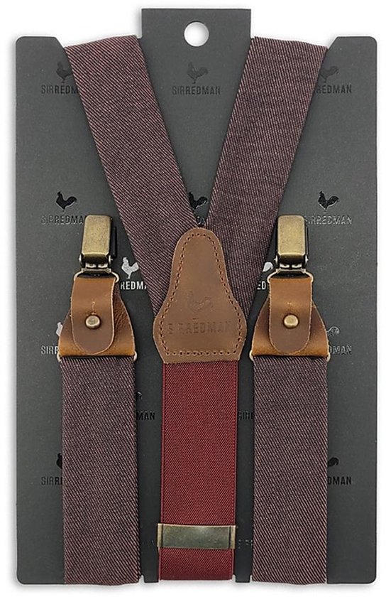 Donkerrode denim bretels met bruine lederen details en gouden clips, gepresenteerd op een zwarte kaart.