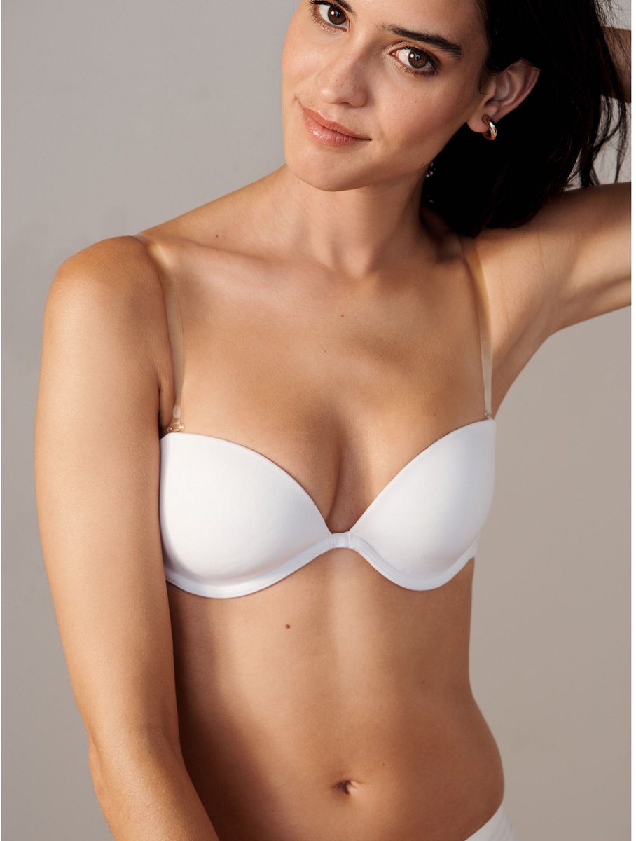 Next Dames - Gladmakende strapless en multiway A-E beha met doorzichtige achterkant - Wit White