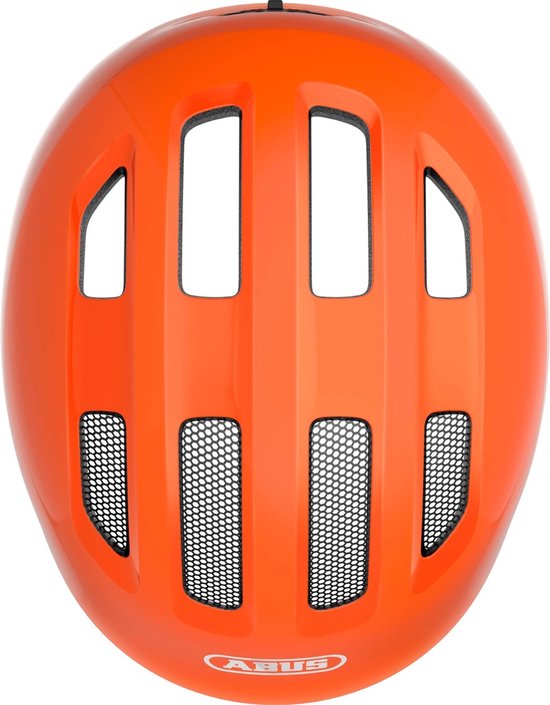 Bovenkant van een oranje fietshelm met ventilatieopeningen en ABUS logo.