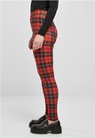 Legging met rode, zwarte en witte ruitjes, van de zijkant gezien.