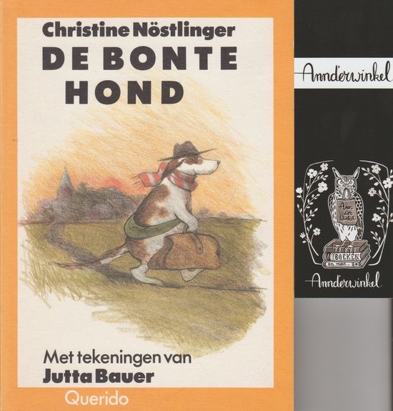 Boek "De bonte hond" met illustratie van een hond met hoed en sjaal, die een koffer draagt.