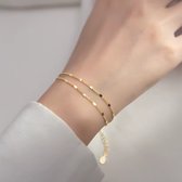 Dames Armband - Elegant Dubbel‑Laags Damesarmband – Goudkleurig - Roestvrij Staal, Luxe & Tijdloos
