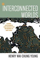 Boekcover voor 'Interconnected Worlds' met een kaart van de wereld die is bedekt met een circuitpatroon en de tekst 'Global Electronics and Production Networks in East Asia'.