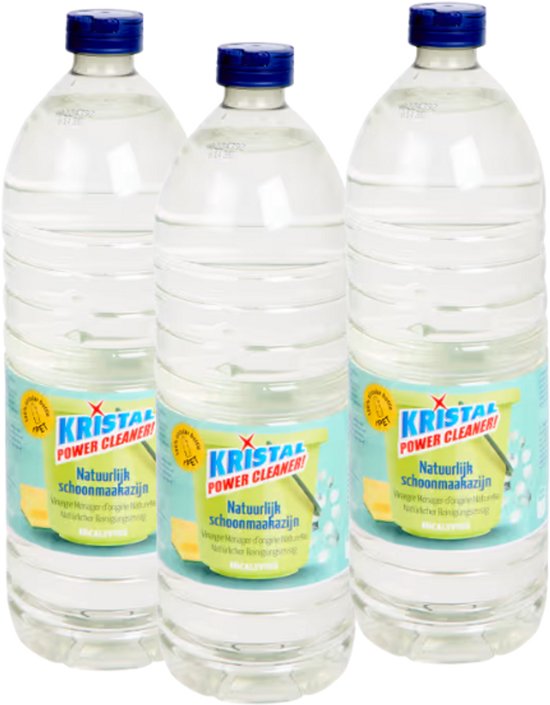 Drie flessen Kristal Power Cleaner Natuurlijk Schoonmaakazijn, met blauwe doppen en labels met citroen en blaadjes.