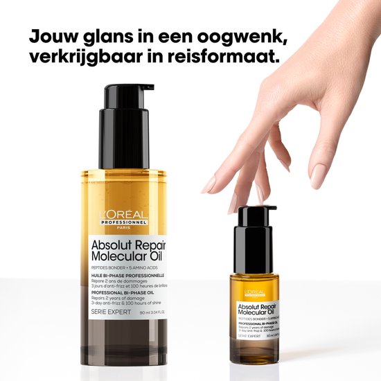 Twee flacons L'Oréal Absolut Repair Molecular Oil, een grote en een reisformaat.