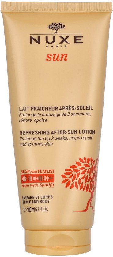 Nuxe Sun after-sun lotion tube, gouden kleur met rode boomprint. 'Refreshing after-sun lotion'.