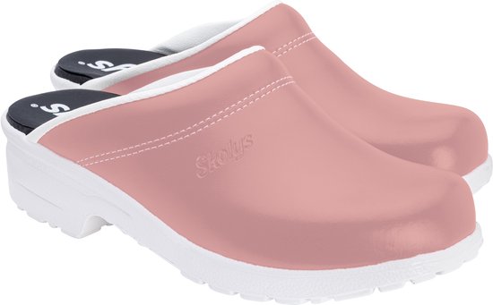 Roze Skolys klompen met witte zool en schacht. Het logo Skolys staat op de zijkant.