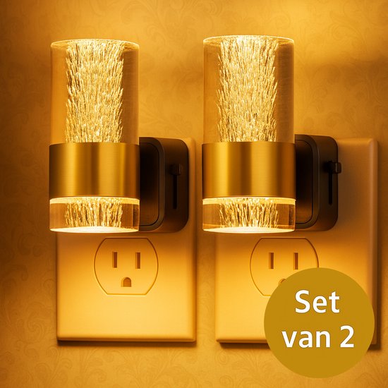 Set van 2 nachtlampjes voor in het stopcontact. Goudkleurige band en kristallen cilinder met bubbels.
