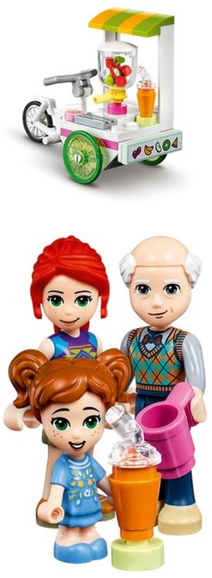 Speelgoedcafé met drie figuren en een sapjeskar.